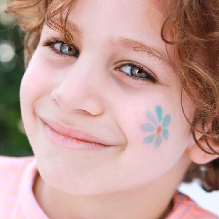 Kaveri Mehta, Lead Design Curator at SimpleLeafLayer, reviewing corporate floral arrangements